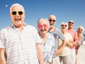 Senior people happy on the beach.