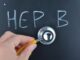 A "HEP B" and stethoscope on the black board