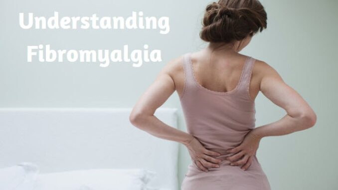A woman has fibromyalgia symptoms on her back