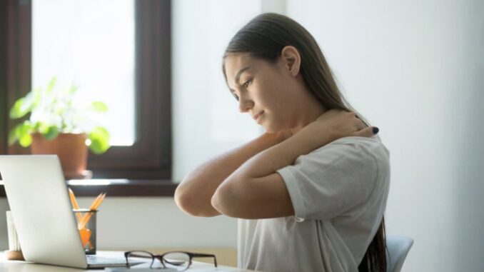 Vitamin D Deficiency Image- A woman has Fibromyalgia Symptoms on her shoulder.