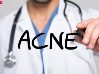 A doctor writing acne word.