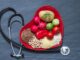 A plate of vegetable and stethoscope