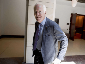 A senior man wearing a suit