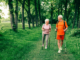 A senior couple walking in the forest