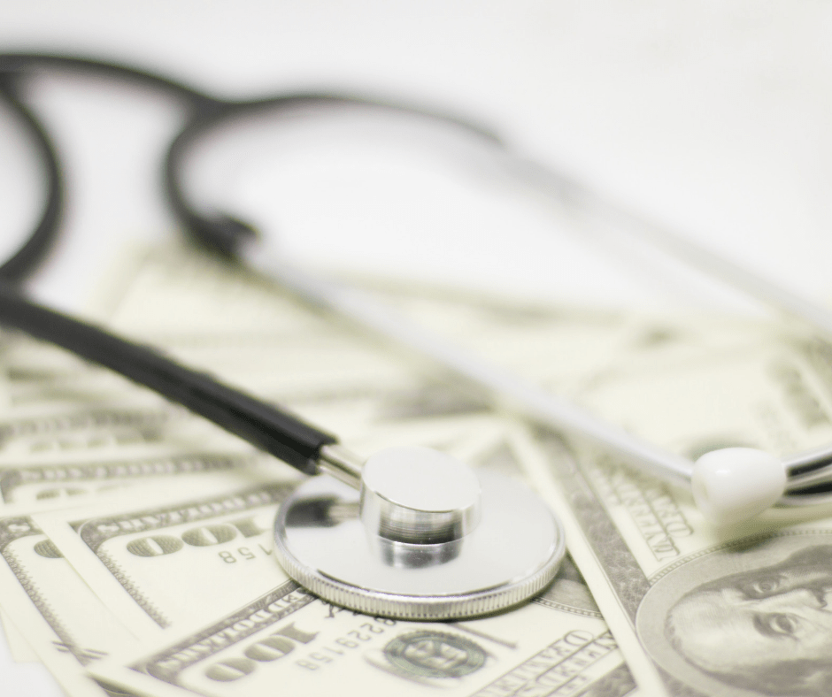 A stethoscope and Us dollars